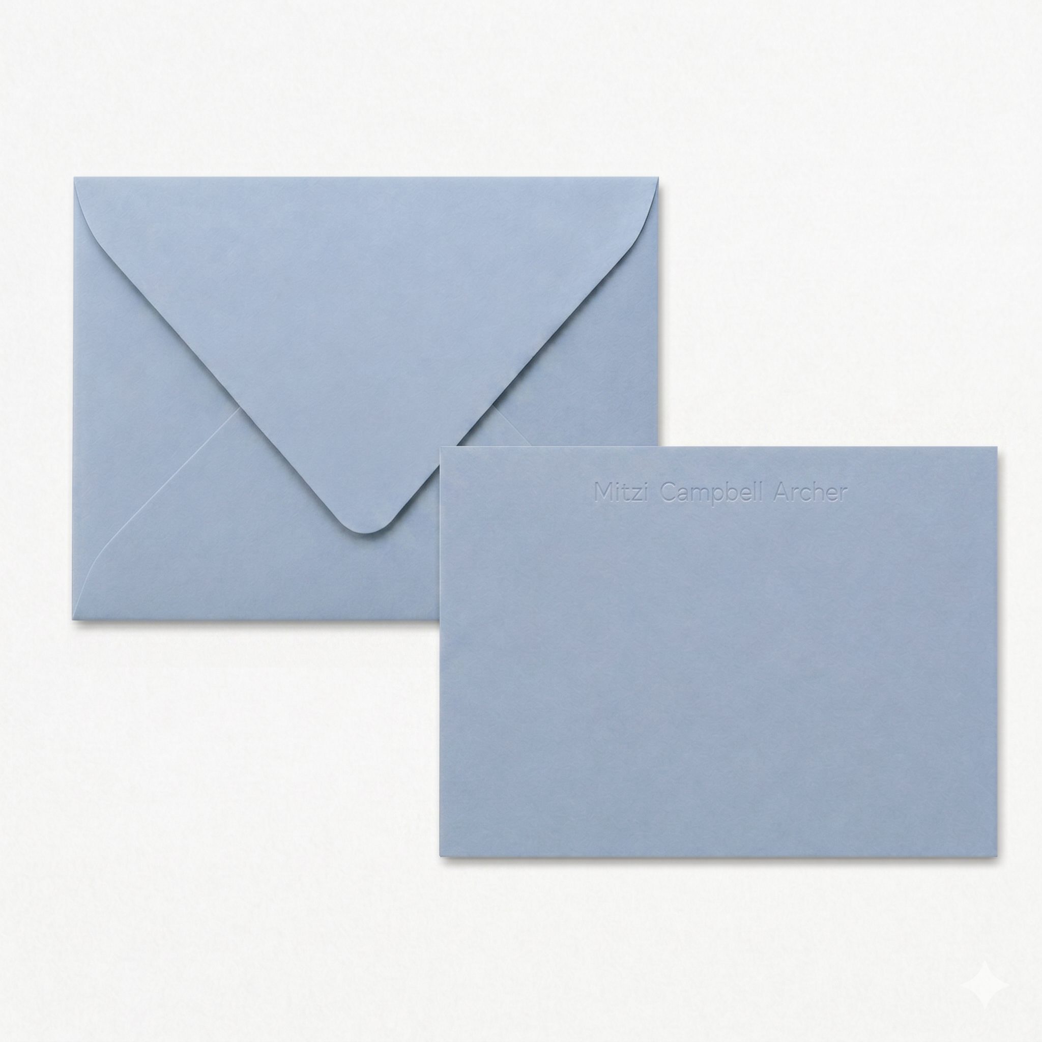 Light blue envelope and A2 notecard personalized debossed sans serif font